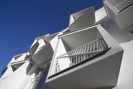 Angular balconies stretch towards sunlight at North Star Apartments by Nice Architects