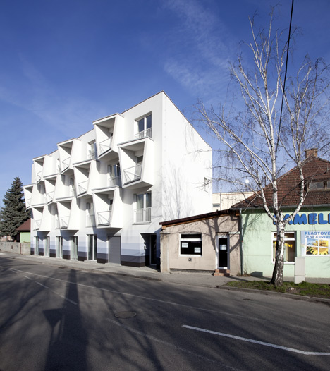 Angular balconies stretch towards sunlight at North Star Apartments by Nice Architects