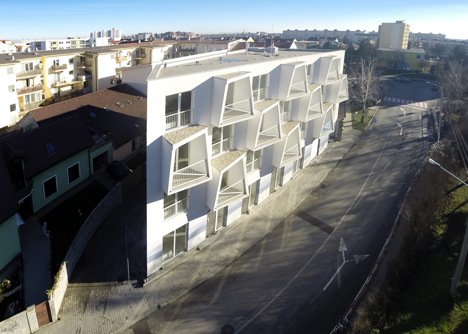 Angular balconies stretch towards sunlight at North Star Apartments by Nice Architects