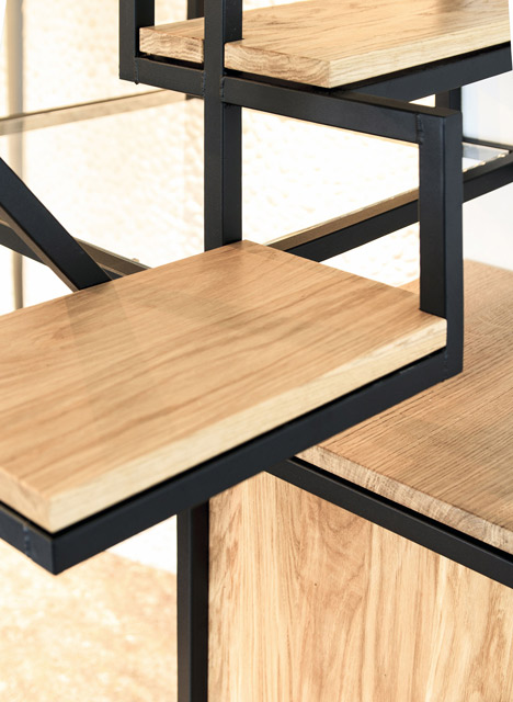 Suspended staircase combined with desk and storage space by Mieke Meijer