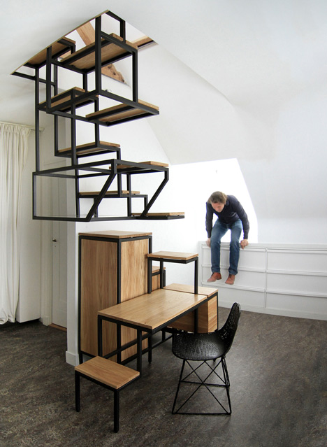 Suspended staircase combined with desk and storage space by Mieke Meijer