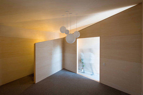 Piano House by NI&Co. Architects offers a secluded spot for making music