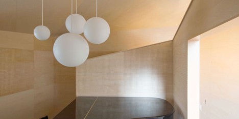 Piano House by NI&Co. Architects offers a secluded spot for making music