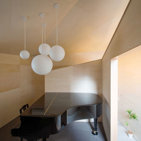 Piano House by NI&Co. Architects offers a secluded spot for making music