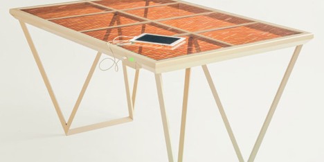 The Current Table by Marjan van Aubel features a solar panel for charging mobile phones