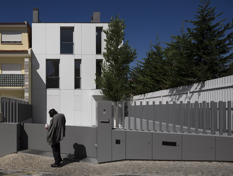 Parede 11 house by Humberto Conde has hinged protective panels