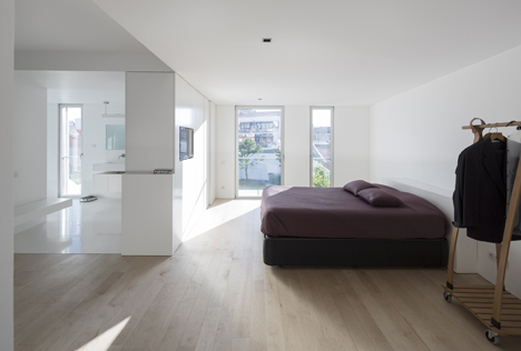 Parede 11 house by Humberto Conde has hinged protective panels
