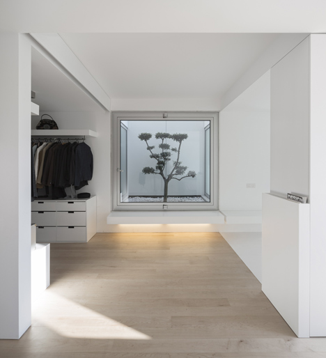 Parede 11 house by Humberto Conde has hinged protective panels