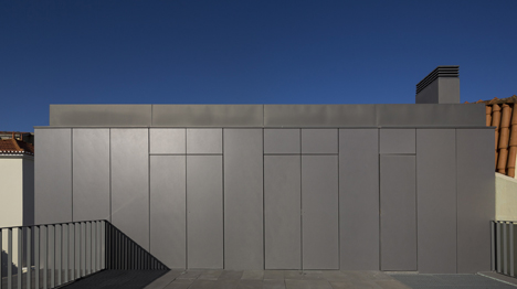 Parede 11 house by Humberto Conde has hinged protective panels