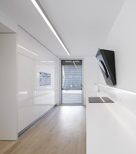 Parede 11 house by Humberto Conde has hinged protective panels