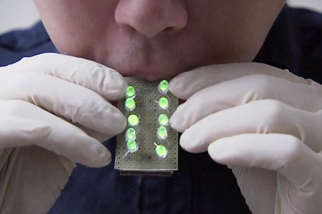 dezeen_Future smartphones could be charged by stroking_2