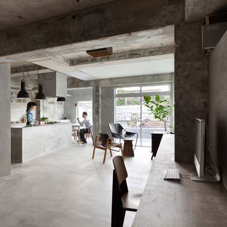 Bare concrete apartment by Airhouse Design Office presents its own fashion exhibitions