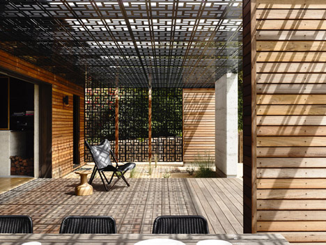 Blairgowrie House by Wolveridge Architects creates a timber-clad seaside home