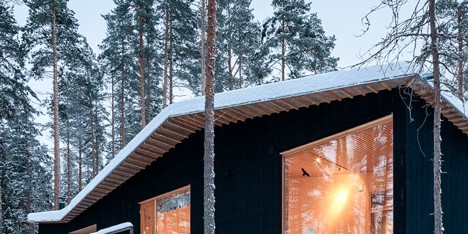 Villa Kettukallio by Playa Architects provides a woodland holiday home