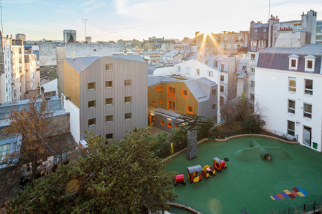 Social housing by Vous Êtes Ici Architectes slots between buildings in Paris