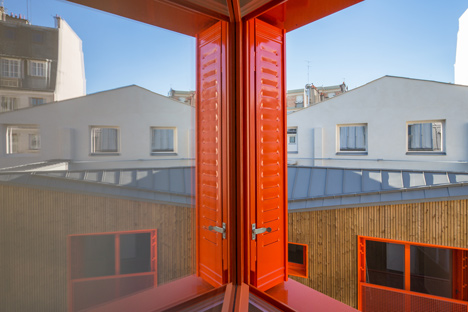 Social housing by Vous Êtes Ici Architectes slots between buildings in Paris