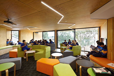 Timber-clad school library extended into the tree tops by Branch Studio Architects