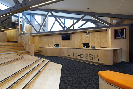 Timber-clad school library extended into the tree tops by Branch Studio Architects