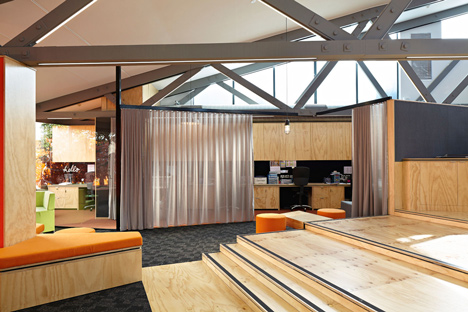 Timber-clad school library extended into the tree tops by Branch Studio Architects