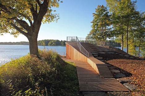 Wooden viewing platform looks out over Latvia's River Daugava