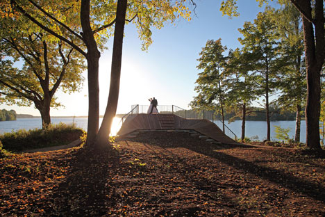 Wooden viewing platform looks out over Latvia's River Daugava