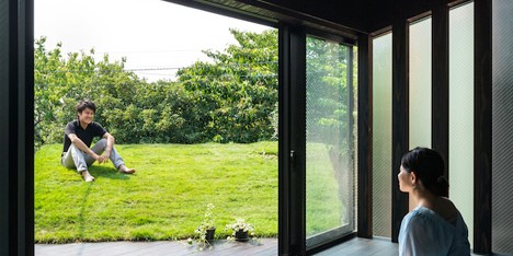 Makiko Tsukada’s Grass Cave House features rooftop lawns and a dark interior