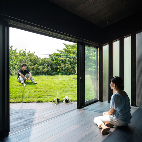 Makiko Tsukada’s Grass Cave House features rooftop lawns and a dark interior