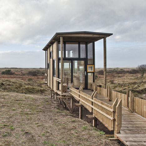 Timber viewing cabin by TYIN Tegnestue overlooks a wild Norwegian landscape