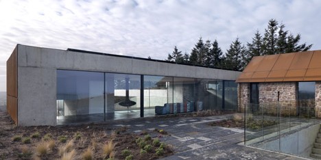 Loyn & Co’s Stormy Castle house pairs concrete and glass with traditional stone