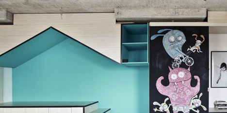 Photography studio by Input Creative Studio features a turquoise playhouse