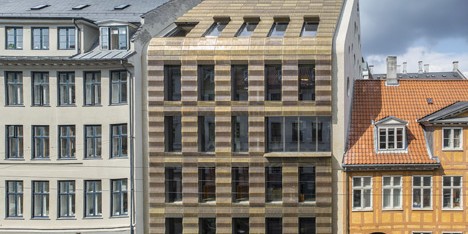 Trollbeads jewellery moves into a golden headquarters by BBP Arkitekter