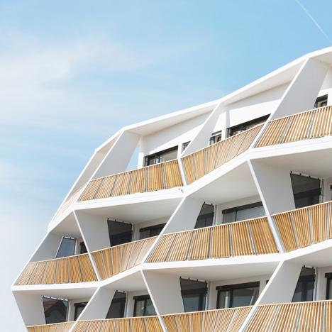 Zigzagging balconies create sculptural facade for Ragnitzstrasse 36 apartment block