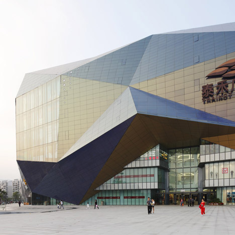 Spark incorporates giant screens into faceted shopping centre facade