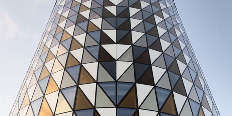Glass triangles animate facade of Wingårdh’s auditorium for Karolinska Institutet