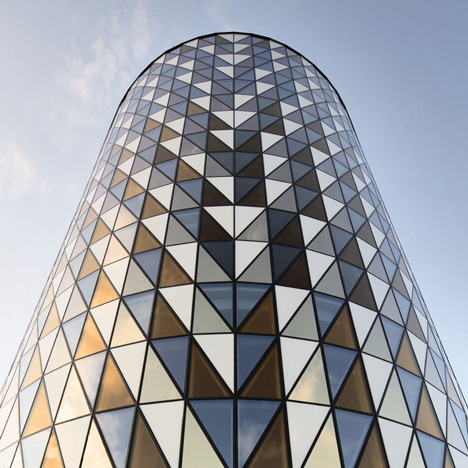 Glass triangles animate facade of Wingårdh’s auditorium for Karolinska Institutet