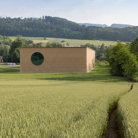 Herzog & de Meuron uses rammed earth to create countryside herb centre for Ricola