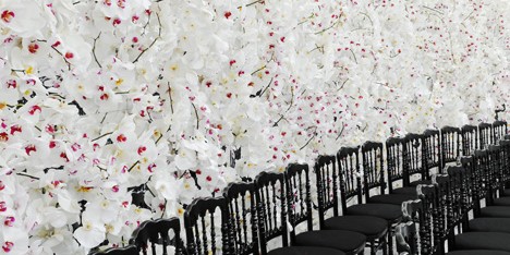 Dior’s feminine haute couture fashion show set against white orchids