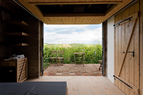 Earthy cabins hide amongst the vineyards<br /> at the Almagyar Wine Terrace in Hungary by by Péter Gereben and Balázs Marián