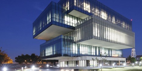 Glass boxes cantilever from the concrete core of Tatiana Bilbao’s Bioinnova university building