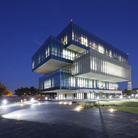 Glass boxes cantilever from the concrete core of Tatiana Bilbao’s Bioinnova university building