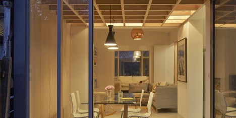 Doyle Gardens extension by Jonathan Tuckey features a criss-crossing wooden ceiling