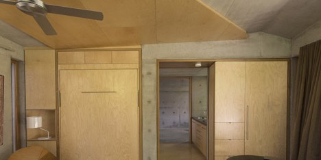 Concrete den by Welsh + Major nestles in a Sydney garden