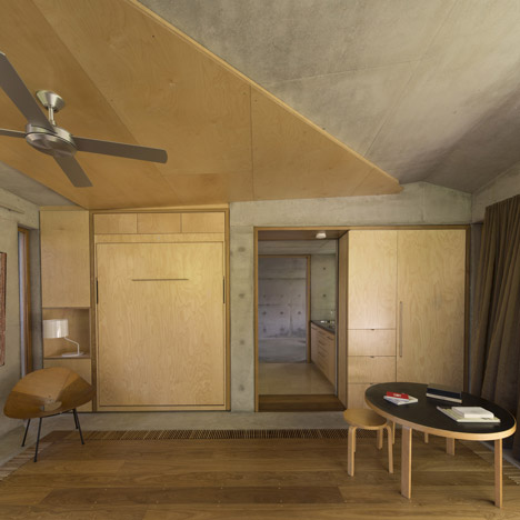 Concrete den by Welsh + Major nestles in a Sydney garden