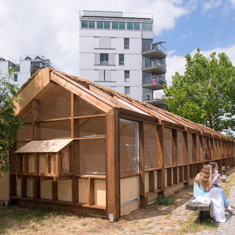 Guinée*Potin Architectes creates “footcheball” playground inside a thatched shed