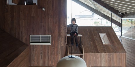 Y+M Design Office envelops seven blocks under one roof with Rain Shelter House