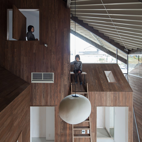 Y+M Design Office envelops seven blocks under one roof with Rain Shelter House