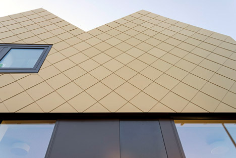 netzwerkarchitekten completes German community centre with metal-clad zigzagging roof