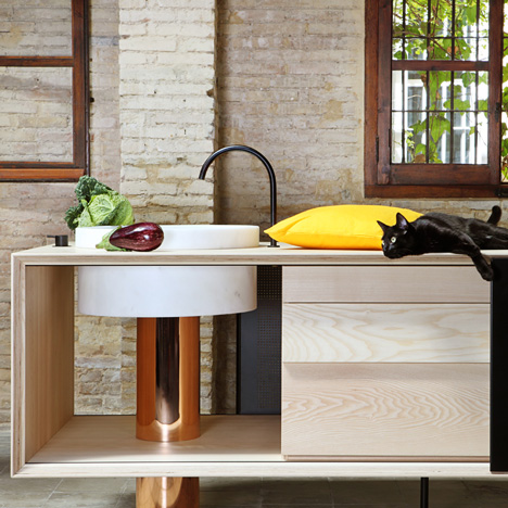 MUT Design uses copper, marble and ash for “seductive” freestanding kitchen