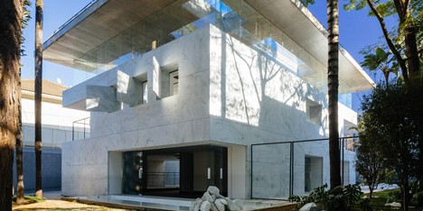 Triptyque’s marble and glass showroom was designed to “look like an ice cube”