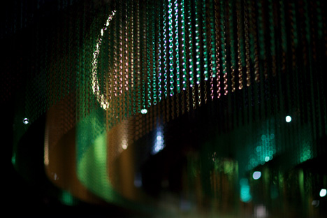 Stylt Trampoli studio plays with lights and shadows across the chain layers at the Stora Hotellet in Umeå, Sweden